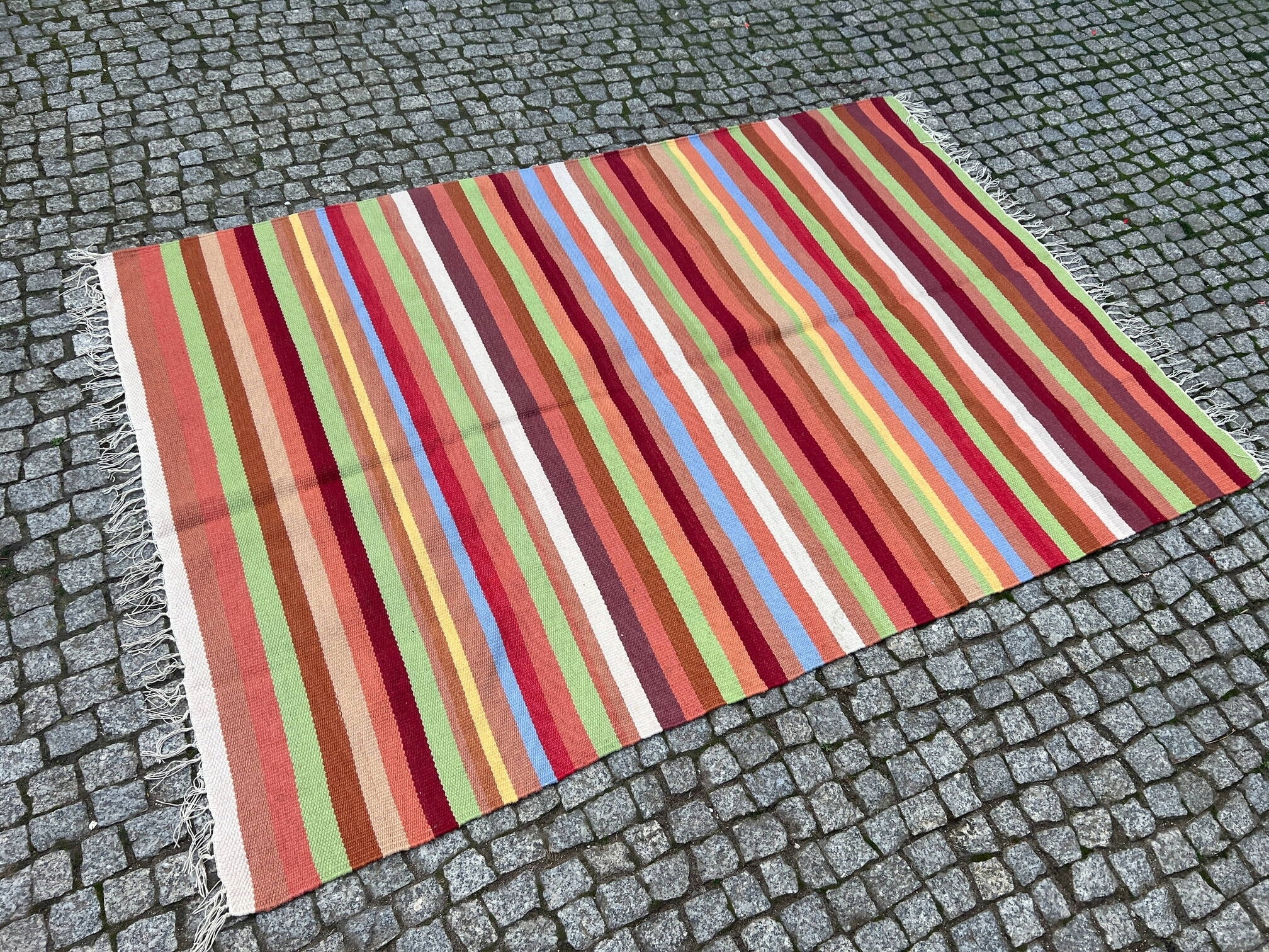 12754867369