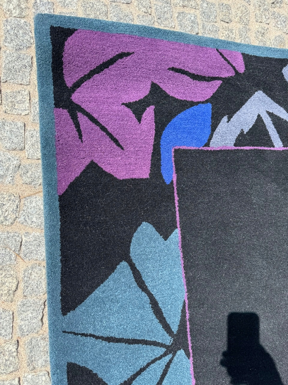15637454875